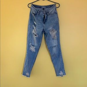 High-waisted ripped jeans